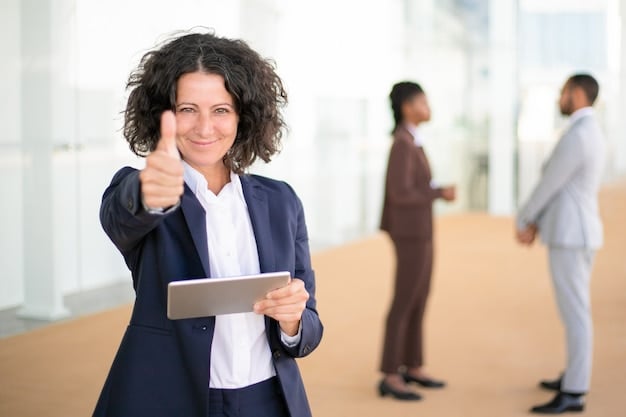 Confident Businesswoman Giving Thumbs Up